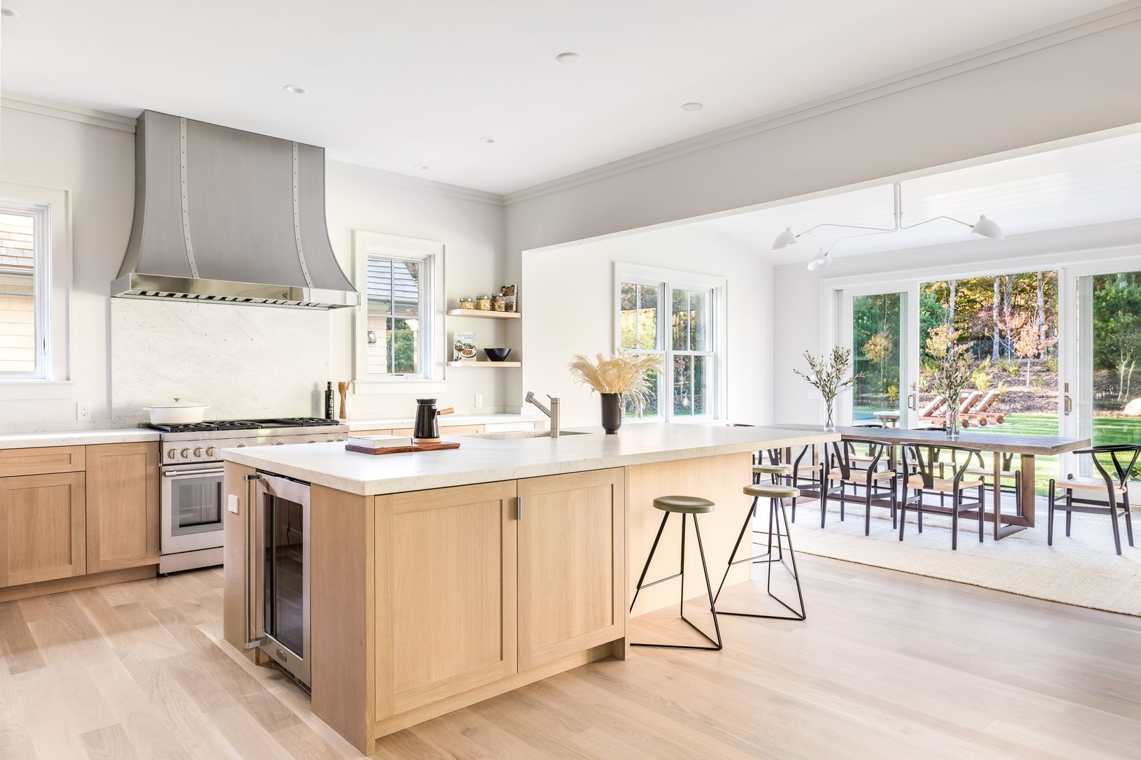  Kitchen 1 | 2" Carrera Countertops, White Oak Cabinetry, Stainless Steel Pulls, Thermador Appliances