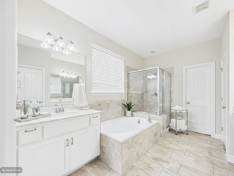 Primary Bathroom - walk-in shower and soaking tub