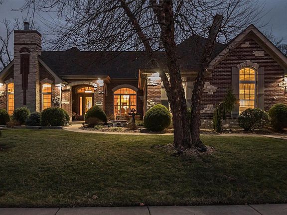 The twilight view really capture the architect's careful placement of the window and the drama in the roof lines.