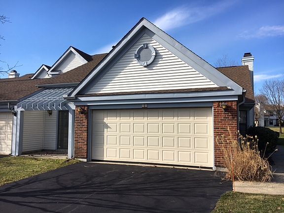 Garage, Patio & den to left