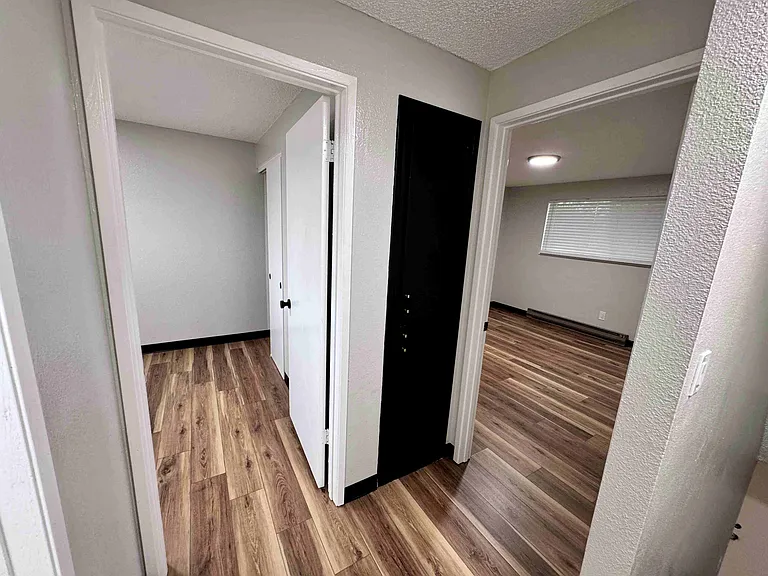 Linen closet next to bedrooms and bathroom.