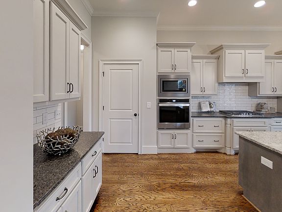 Previously built home based on this plan. Photos not of current home. Upgrades may be pictured.