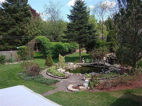 Yard leading to more yard through fence