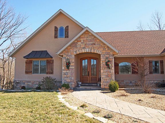 Buyers will appreciate the exterior attention to details - wood shutters, stone accent, and stucco finish.