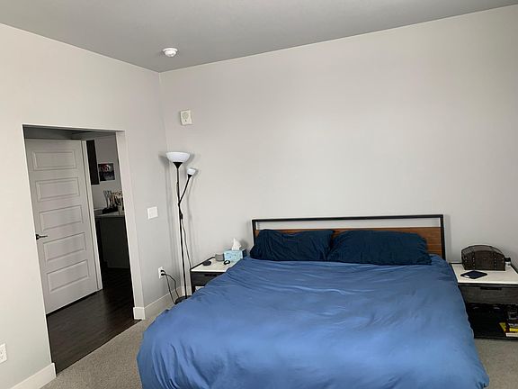 Another view of the bedroom. Large enough for a king sized bed and two end tables + a desk in the corner.