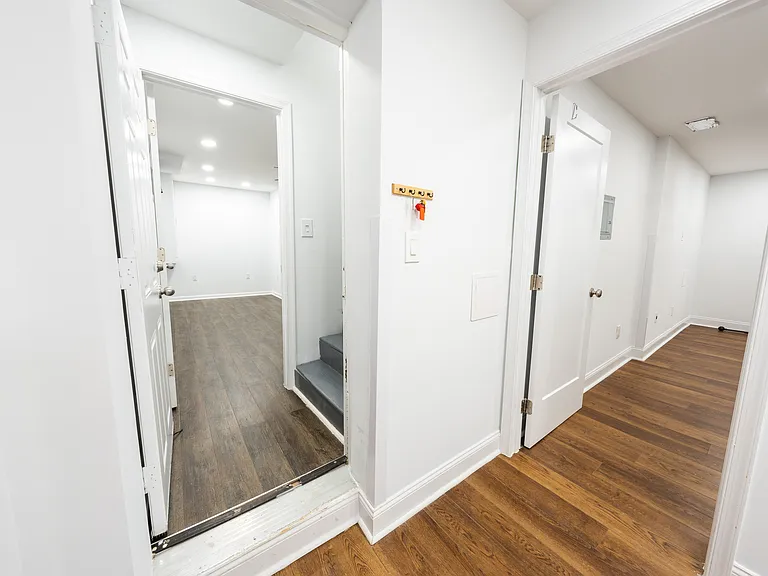 Basement bedroom and office from hallway
