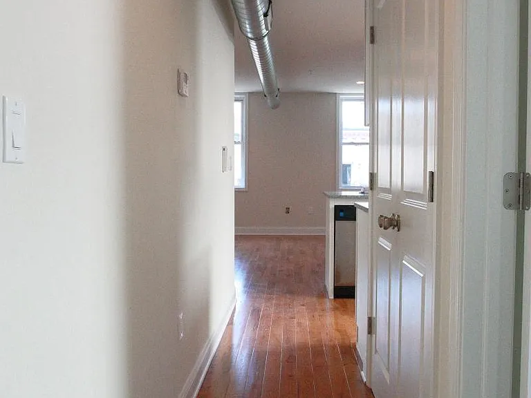 High Ceilings & Hardwood Floors
