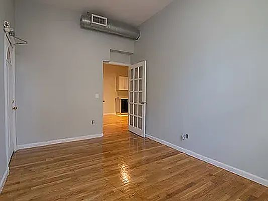 5th image of 107 Troutman St APT 1F