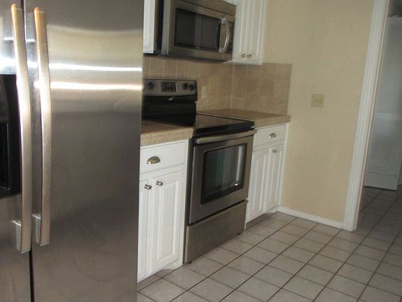 5th image of 503 NW Fairway Villa Pl APT 2