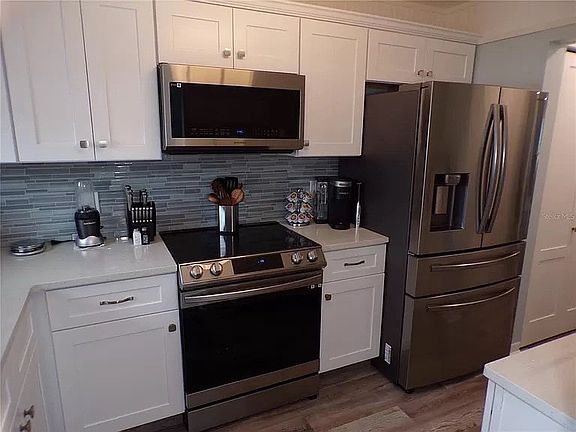 2nd image of 5660 80th St N Unit B207