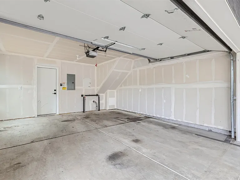 Two car garage with excess space for all your gear