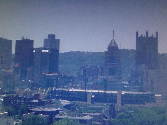 Veiw of whole downtown area including skyline of Mt. Washing