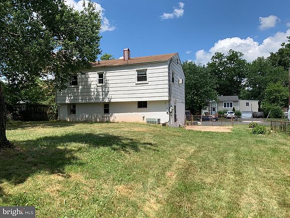Large, fenced rear yard with drive through gate.