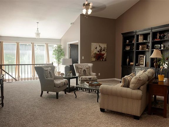 The entry opens up to large vaulted living room that overlooks the backyard.