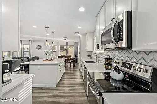 10617 W Daley Ln Photo 1