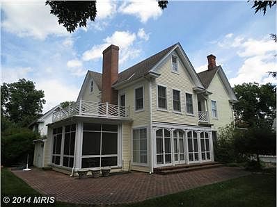Rear porch and deck off master Br with water view