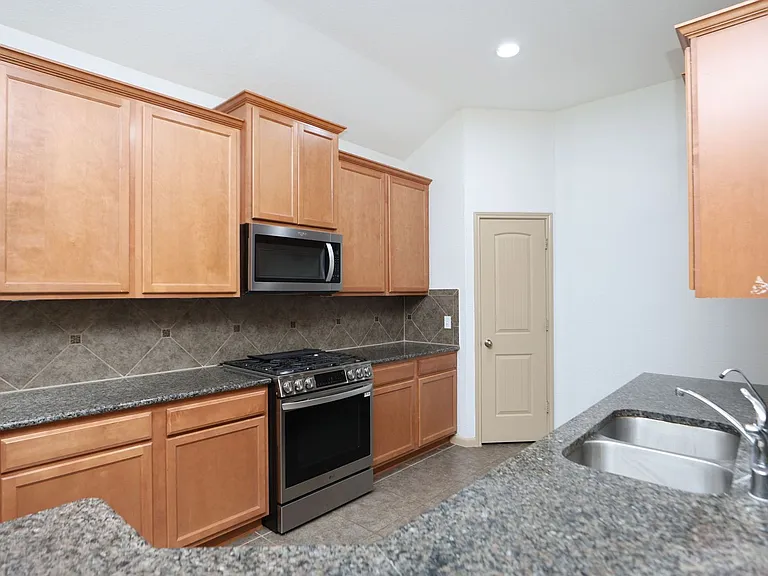 7042 Windy Run Ct — Photo 20
