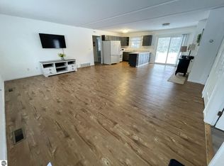 10511 Lake Of The Woods Rd, Mancelona, MI 49659