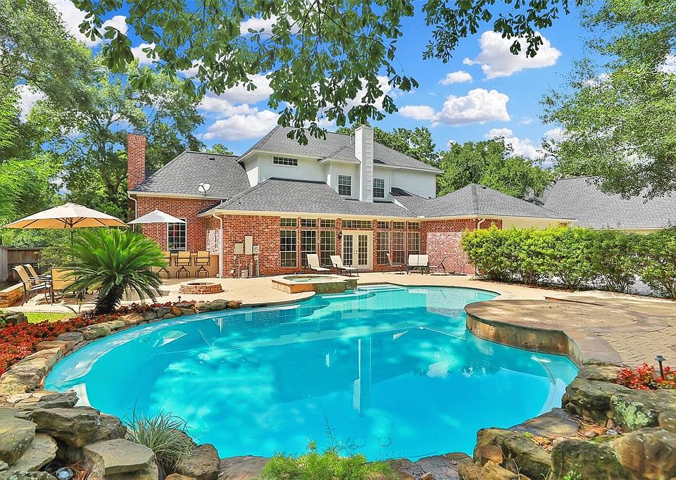 STUNNING BACKYARD OASIS: Just in time for spring and summer enjoyment, this gorgeous backyard provides plenty of space for family fun and entertaining.