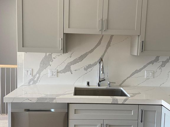 Kichen sink and cabinets