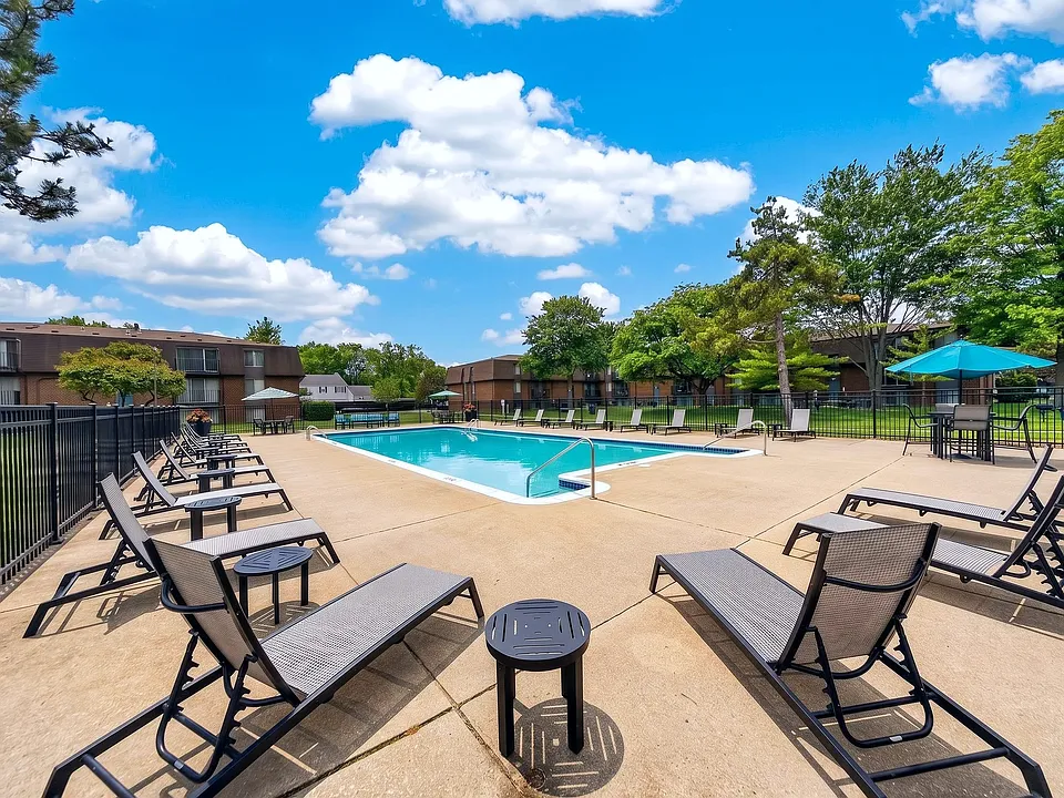 Heated pool and sundeck at Drawbridge Apartments in Harrison Township, MI.