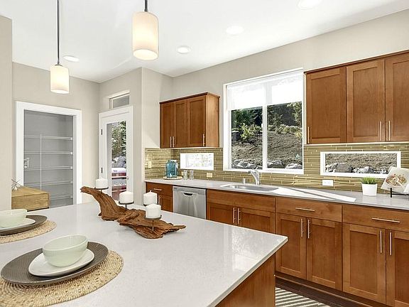 Kitchen and spacious pantry on main floor
