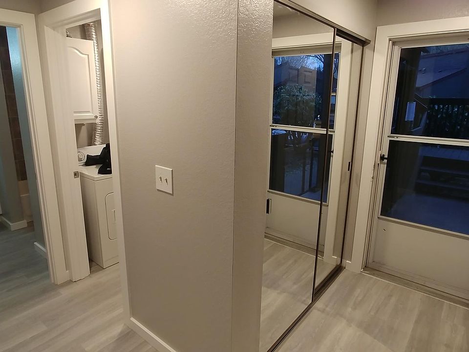 Entrance with mirror door closet