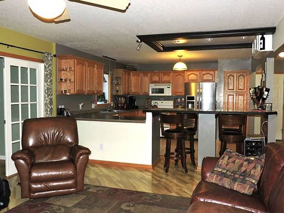 Open living concept keeps the family together, whether in the kitchen, living room or family room.