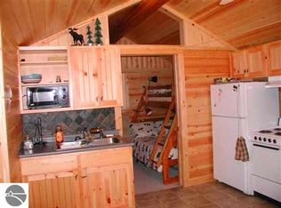 8843 Deadstream Rd, Honor, MI 49640