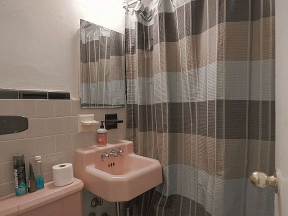 5th image of 306 E 18th St APT 3