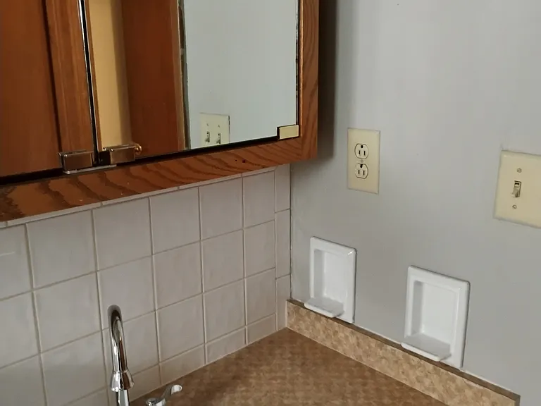 This is the downstair bathroom with shower/ toilet/ Sink
