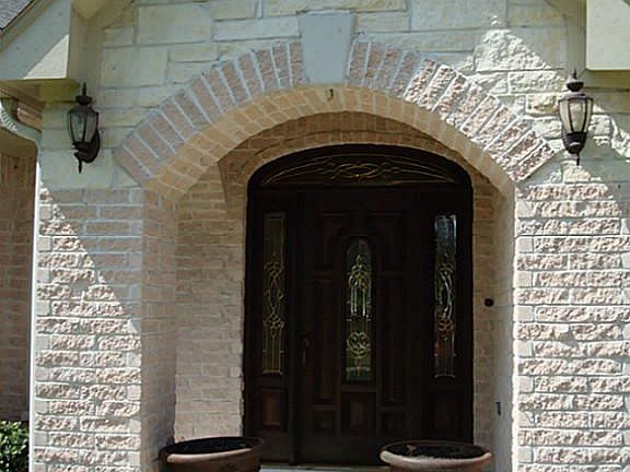 Fabulous entryway with custom brick design.