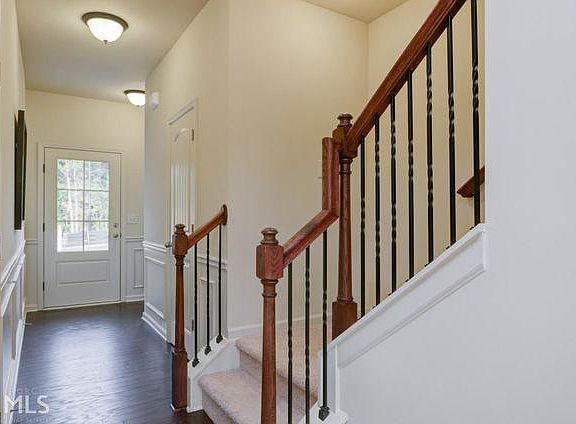 Stairs going up to all the 3 bedrooms and media loft