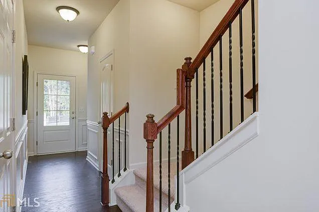 Stairs going up to all the 3 bedrooms and media loft - 136 Hickory Village Cir