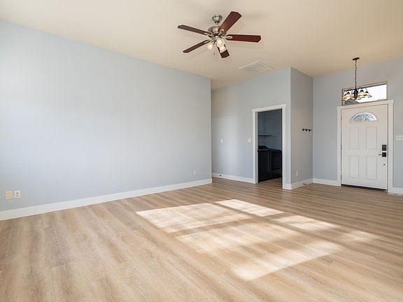 Looking towards laundry room and front door