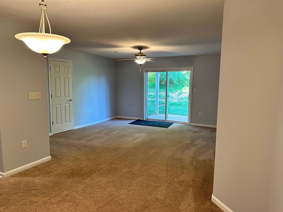 Living and dining area with walkout patio area