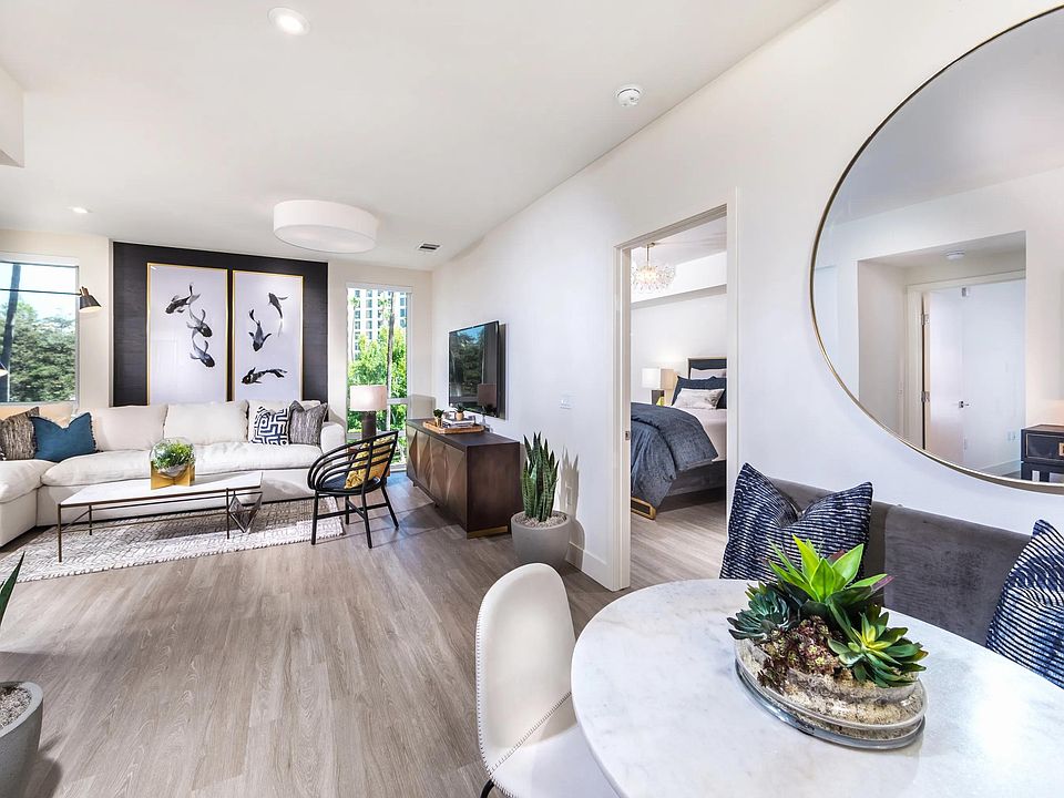 Dining and lounge space offering easy access to the outdoor balcony.