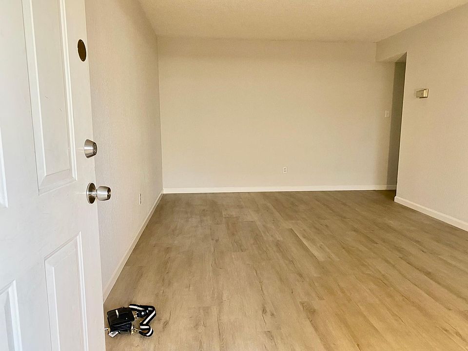 Large Livingroom with new flooring and paint
