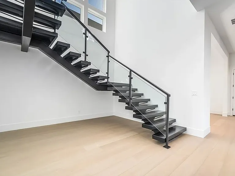 Modern Single Spine Staircase with glass side railings