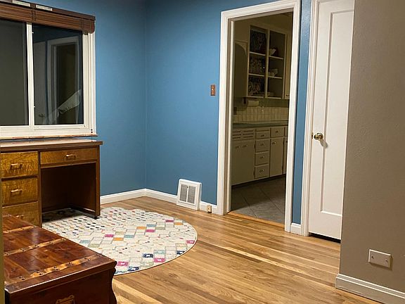 Office area off of living room and kitchen
