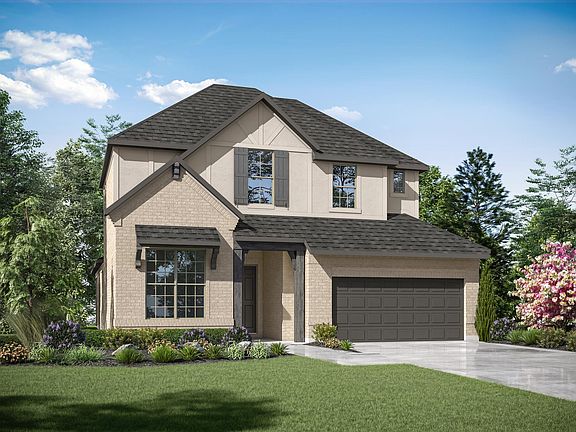 two-story home with brick and stucco