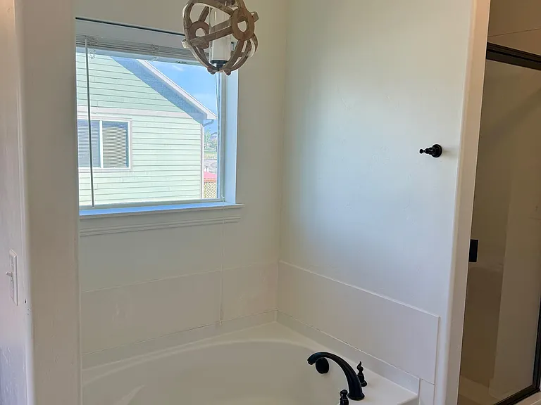 Master bathroom with garden tub and shower.