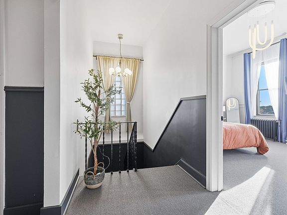 Private hallway to bathroom and kitchenette