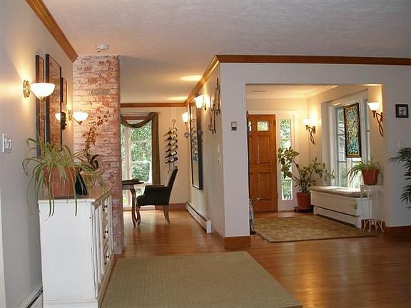 Fabulous entry with glowing wood floors