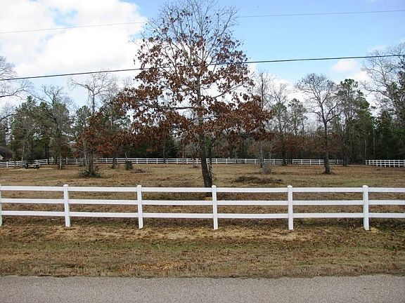 VIEW OF NEIGHBOR IN FRONT, HORSES ON 5-ACRE PASTURE