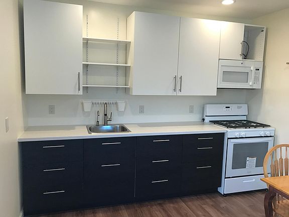 kitchen, spacious cabinets, easy glide draws, gas range, filtered drinking water tap