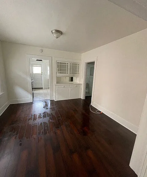Hardwood floors and built in cabinets at The Villas Apartments in Pasadena, CA.