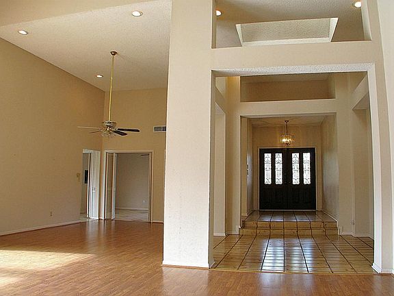 The living room and dining room are an impressive space for entertaining. (Pictures taken before hom