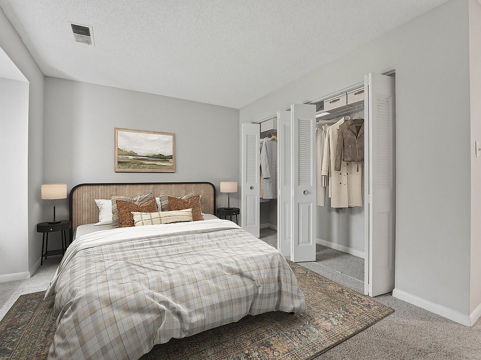 Welcome to Eagle Rock Apartments at Belcamp, where modern design meets comfort. This beautifully appointed bedroom features spacious closets and a cozy ambiance, perfect for relaxation. Explore your new home today! Schedule a tour now!