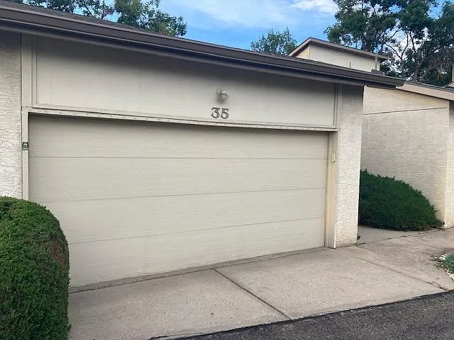 2-car garage with secure electric garage door.